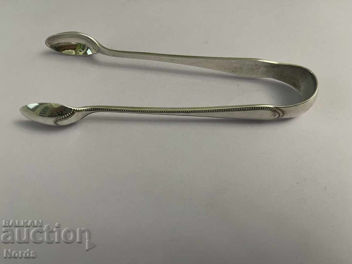 Аукцион Посребрена щипка за лед с маркировка Аукцион Посребрена щипка за лед с маркировка