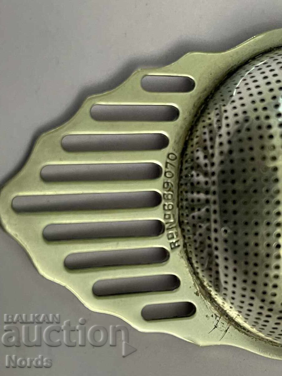 Доставка на Посребрена цедка с маркировка