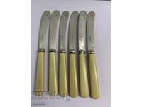 Ασημένια μαχαίρια με σήμανση