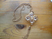 Gold necklace with crystals - flower with tassel