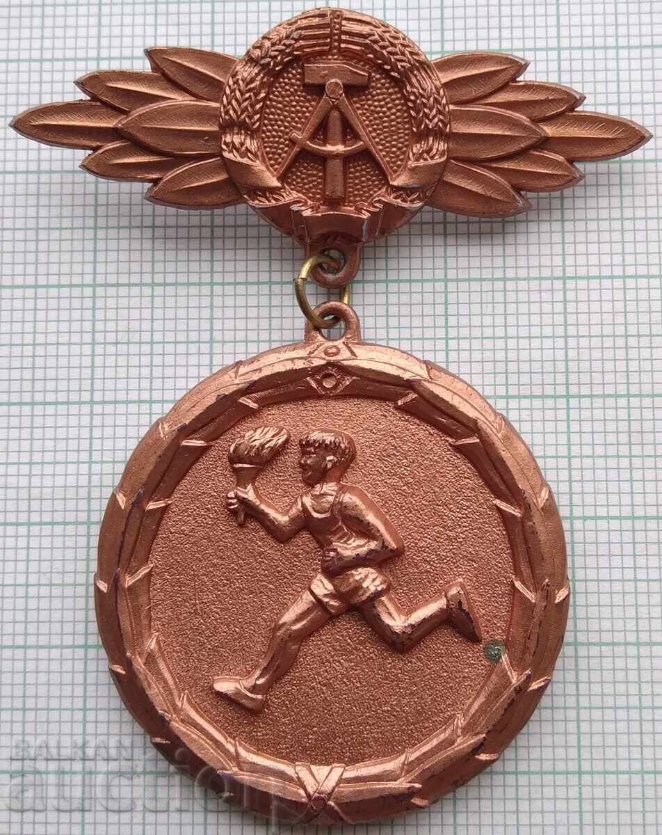 19406 Insigna - Tabără Centrală de Pionieri RDG