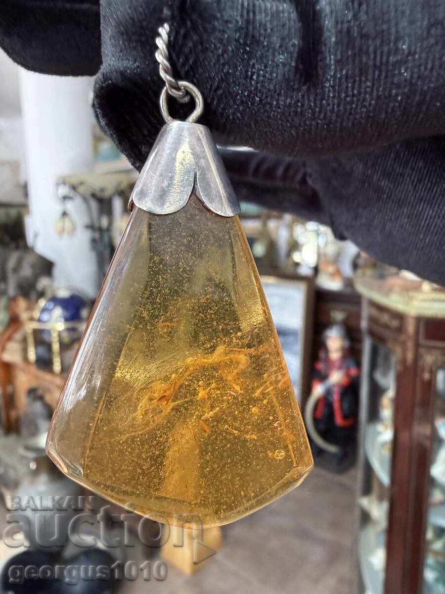 Amber pendant with silver mount №7835