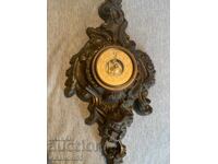 Old massive bronze barometer