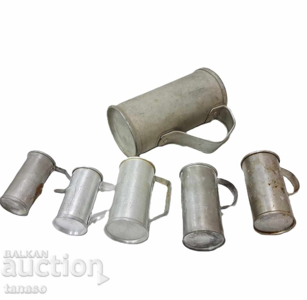 Old metal liquid measures - 6