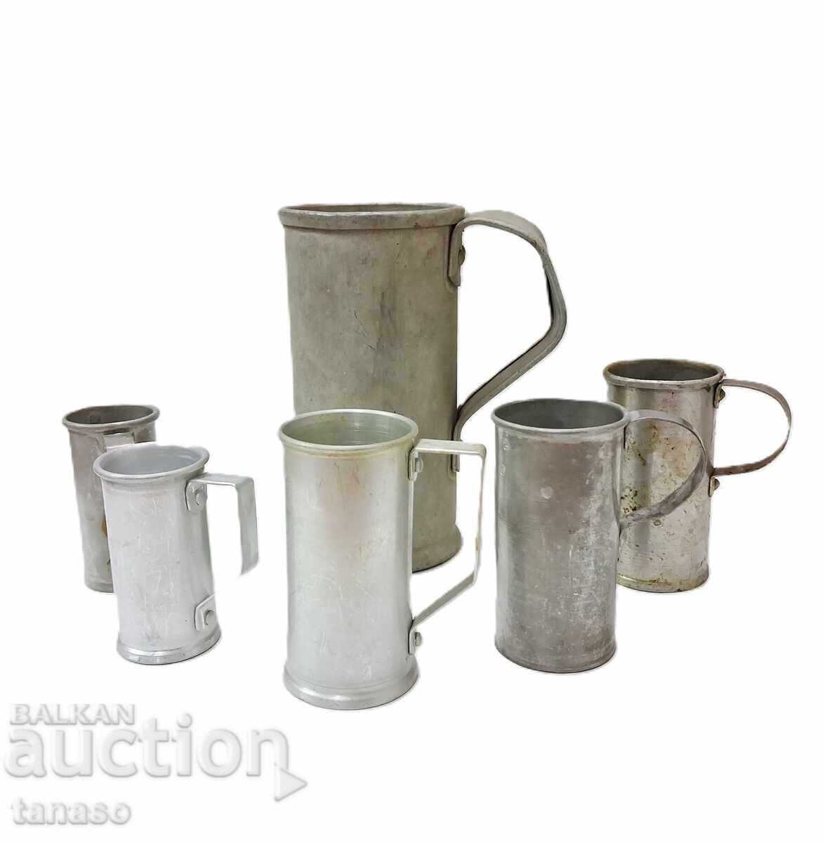 Old metal liquid measures