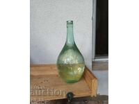 Old small demijohn 2 liters