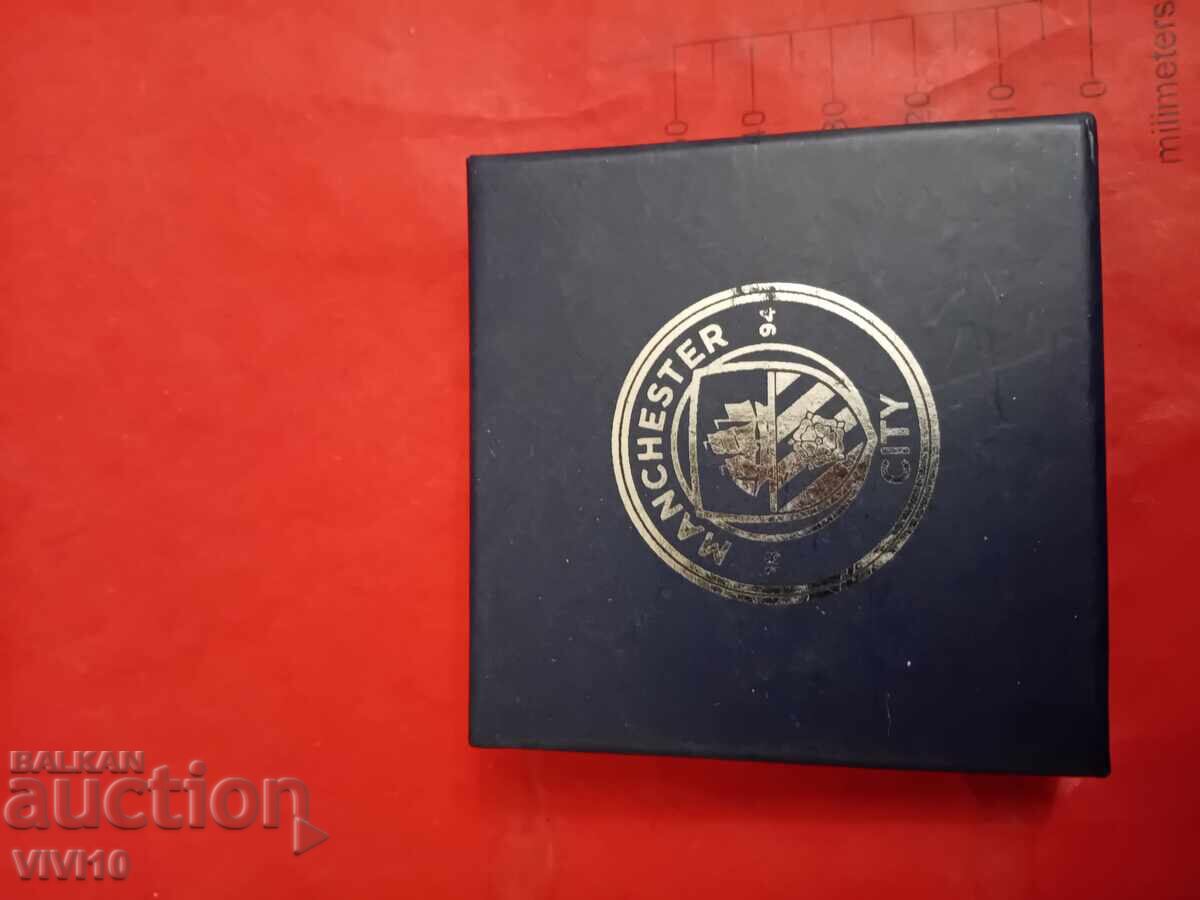 Emblemă, FC Manchester