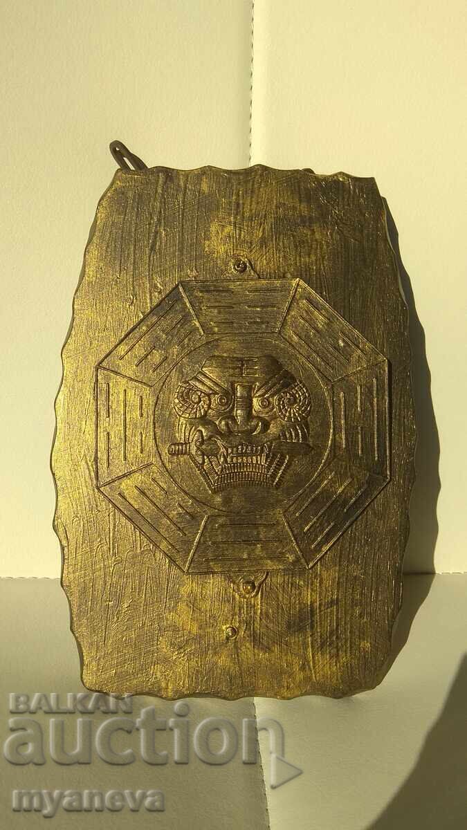 Samurai sign with a metal plaque on wood with a chain