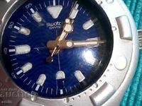 Beautiful Swatch Irony, works perfectly, with a new battery