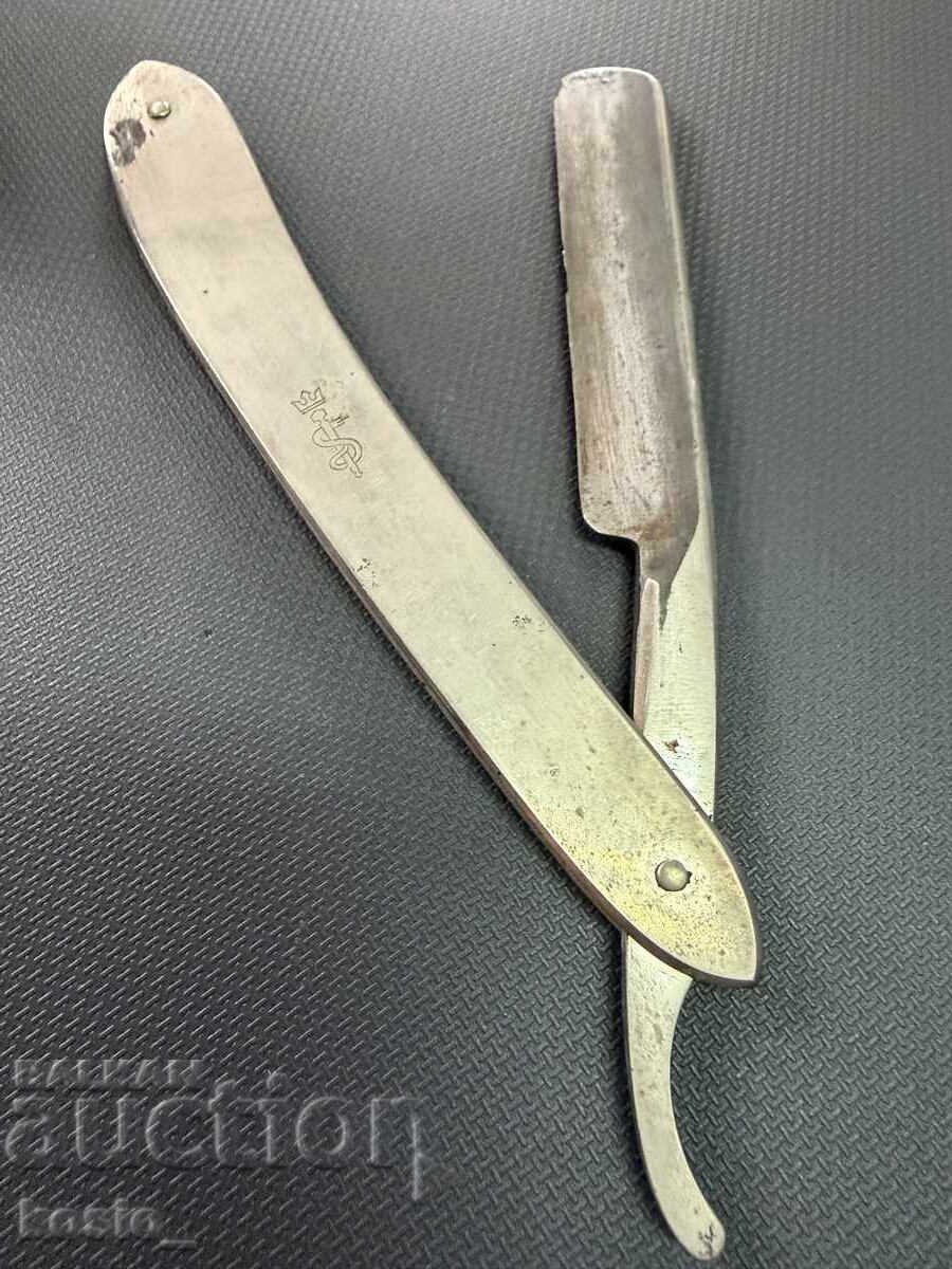 Vechi aparat de ras masiv