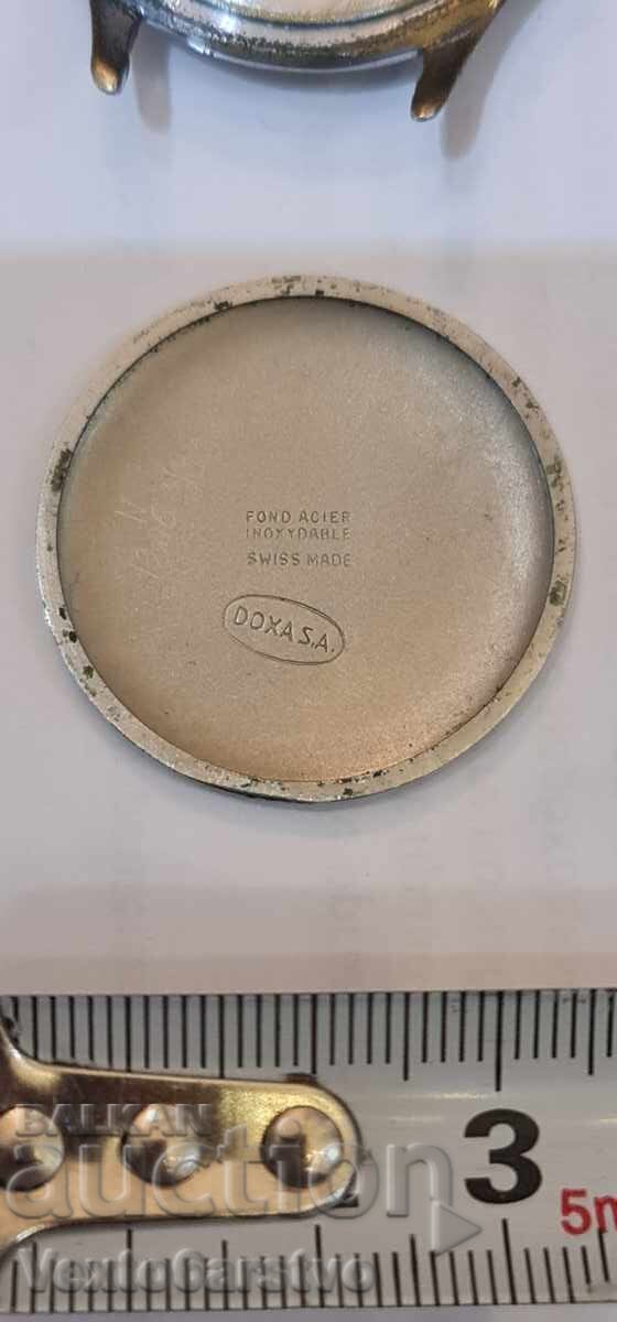 Licitație Ceas "DOXSA"---dim. 35 mm. FUNCTIONEAZĂ-FĂ DEFECT