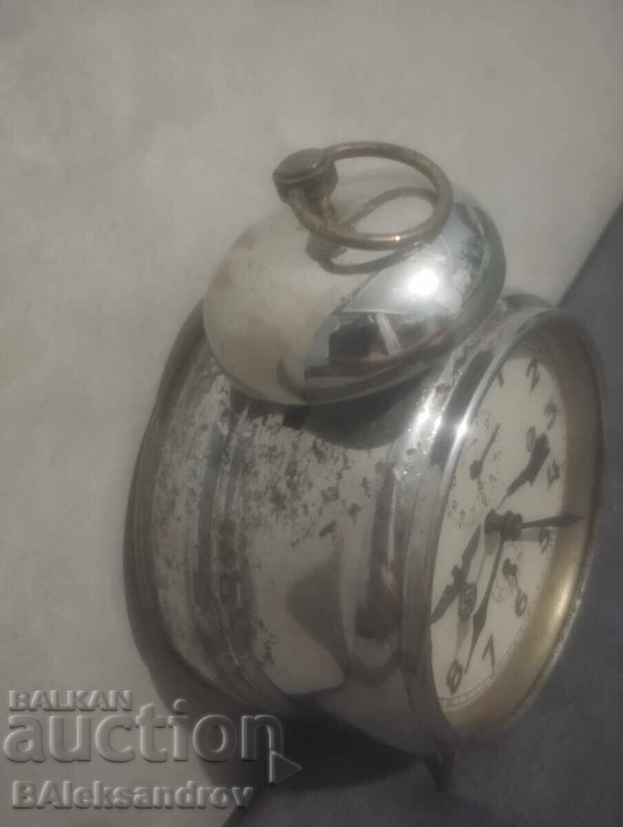 Livrarea Ceas deșteptător german vechi de colecție Livrarea Ceas deșteptător german vechi de colecție