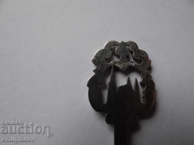 Licitație O lingură de argint