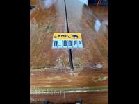 Πινακίδα τιμών Camel