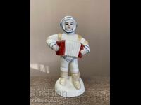 Statuetă de porțelan vintage „Cosmonaut cu acordeon”, URSS