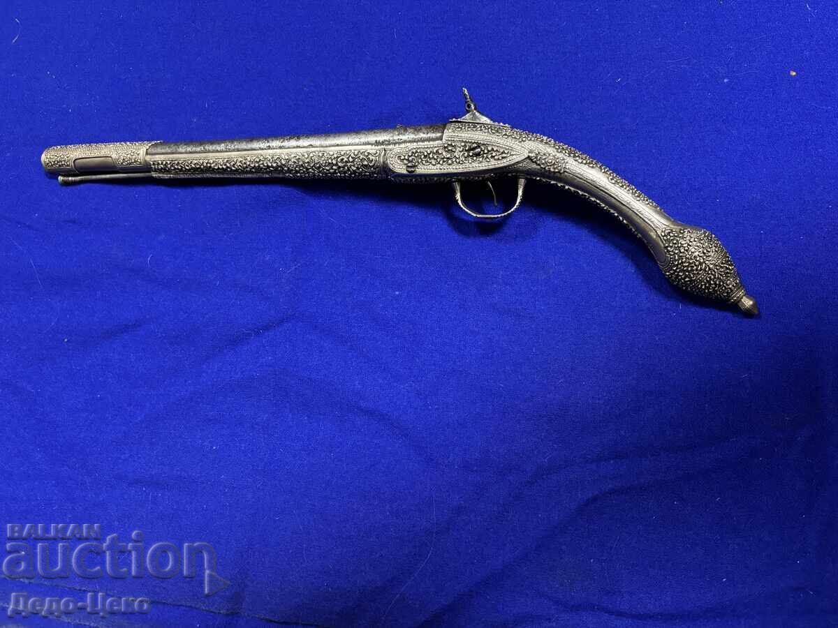 Auction  Silver Flintlock Pistol