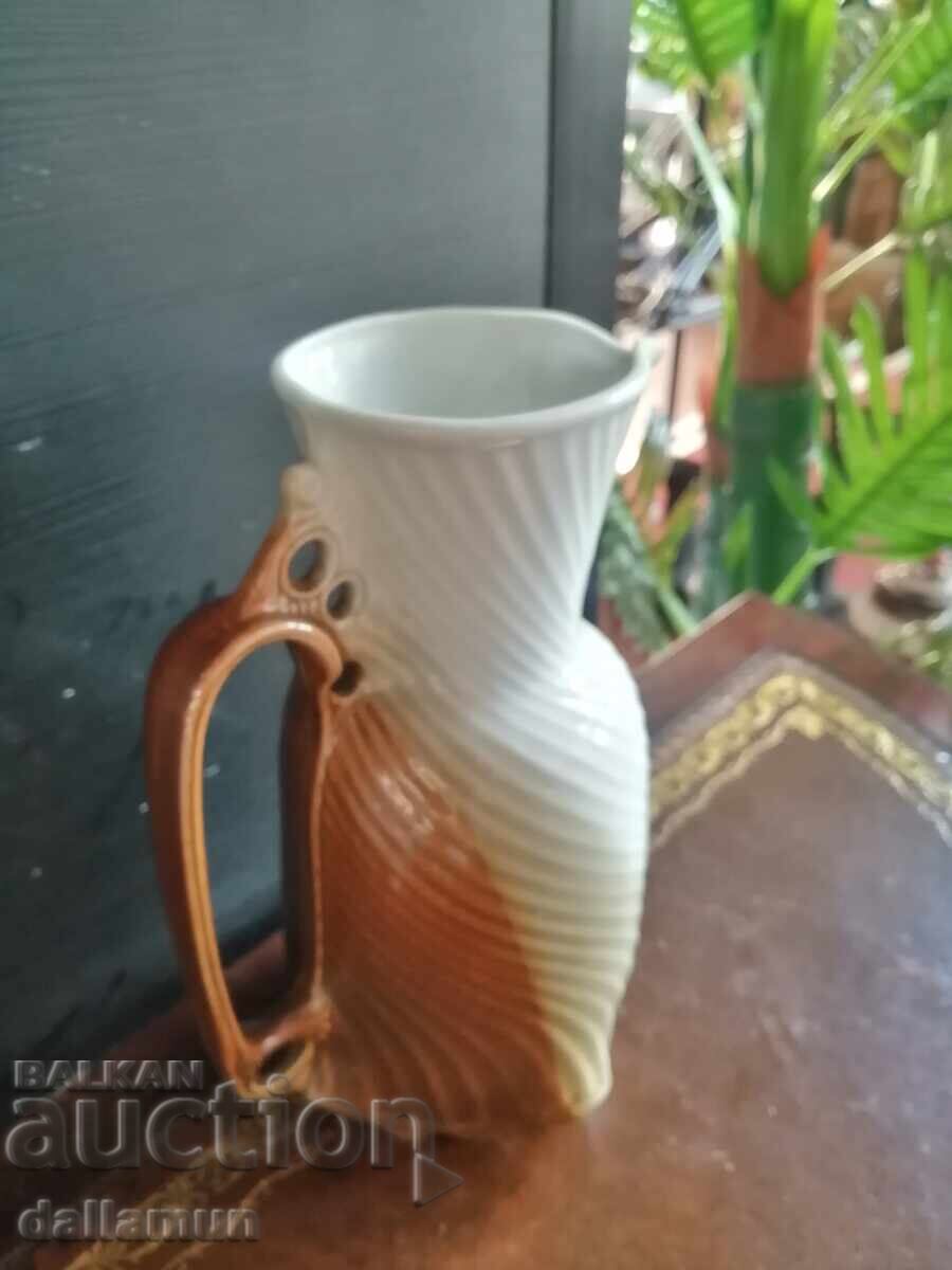 Auction  Old porcelain jug