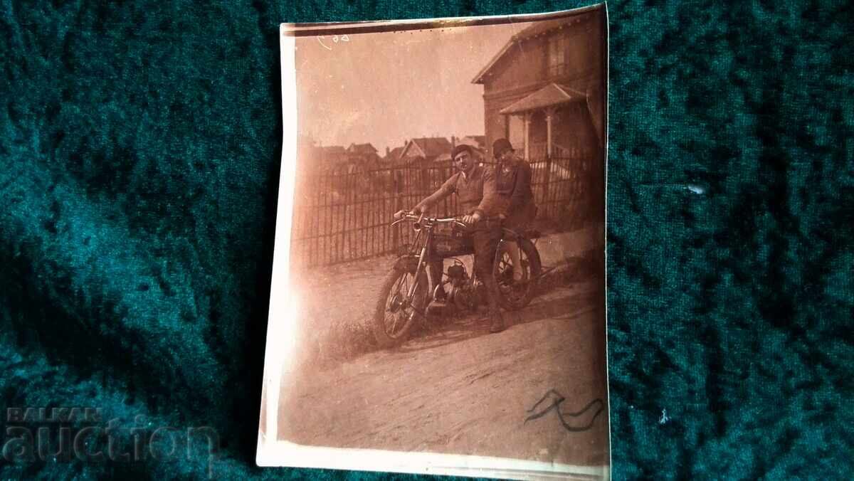 Auction  Old photo. Boys on an old motorcycle