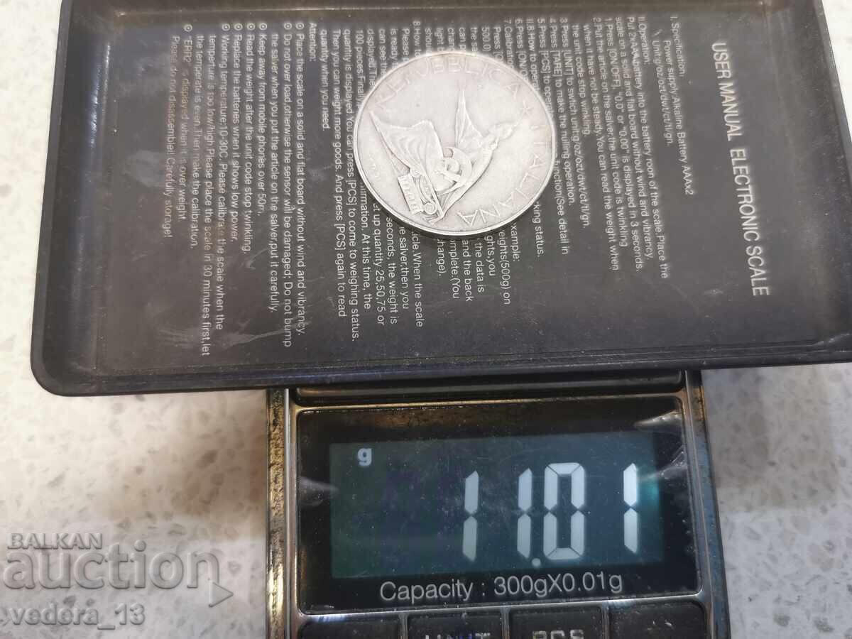 Licitație moneda de argint