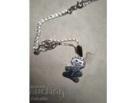 Silver necklace with a bear pendant