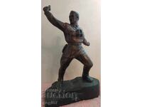 Sculpture Russian soldier in attack USSR