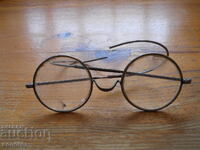 Antique glasses in a case