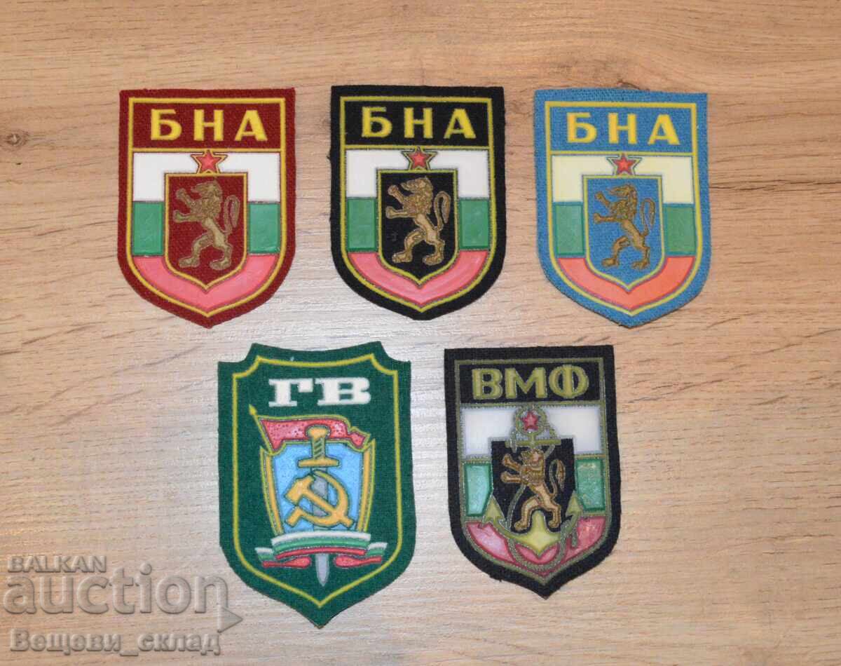 Uniform emblems of the BNA, Air Force, Navy, Civil Defense