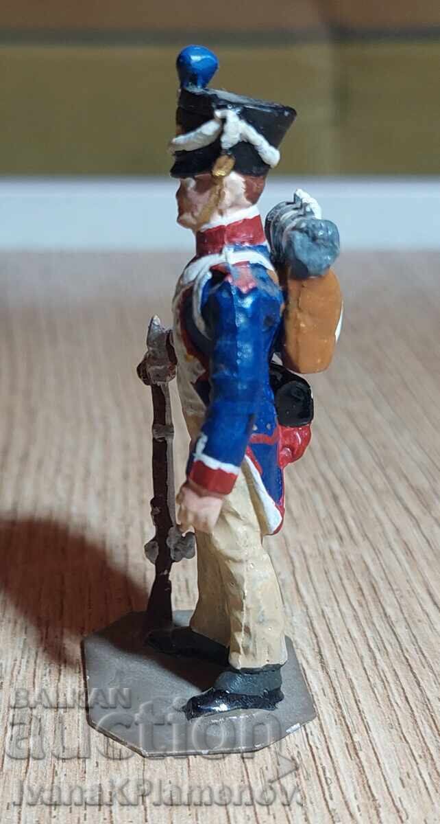 Livrarea O figurină de plumb pentru colecționari