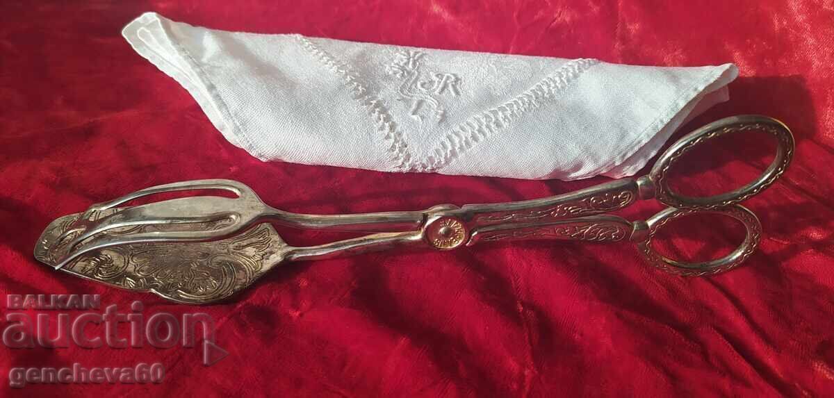Auction  Vintage silver-plated serving clip