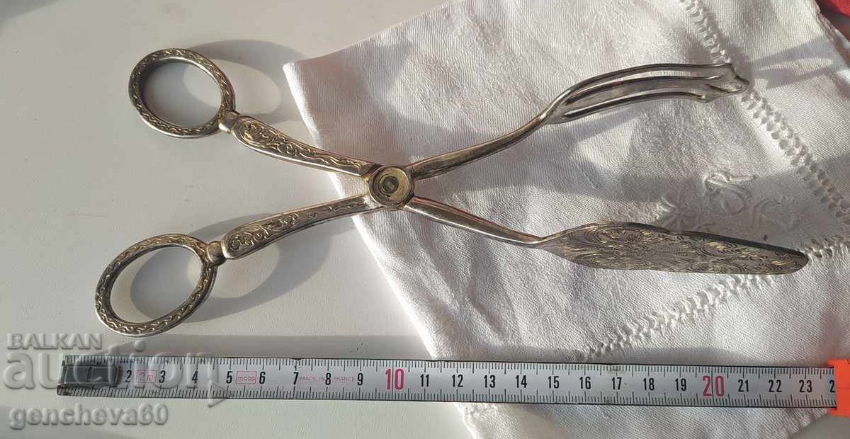 Livrarea Clește vintage argintat pentru servire