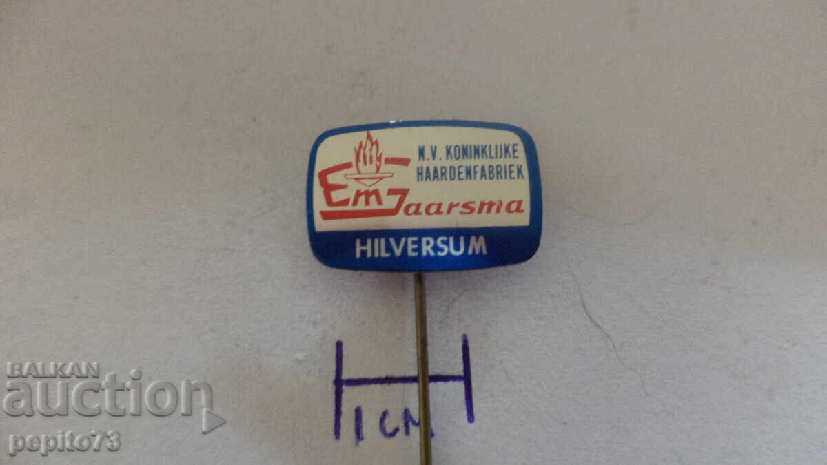 Semn publicitar, Jaarsma Hilversum, marcă de șeminee și sobe