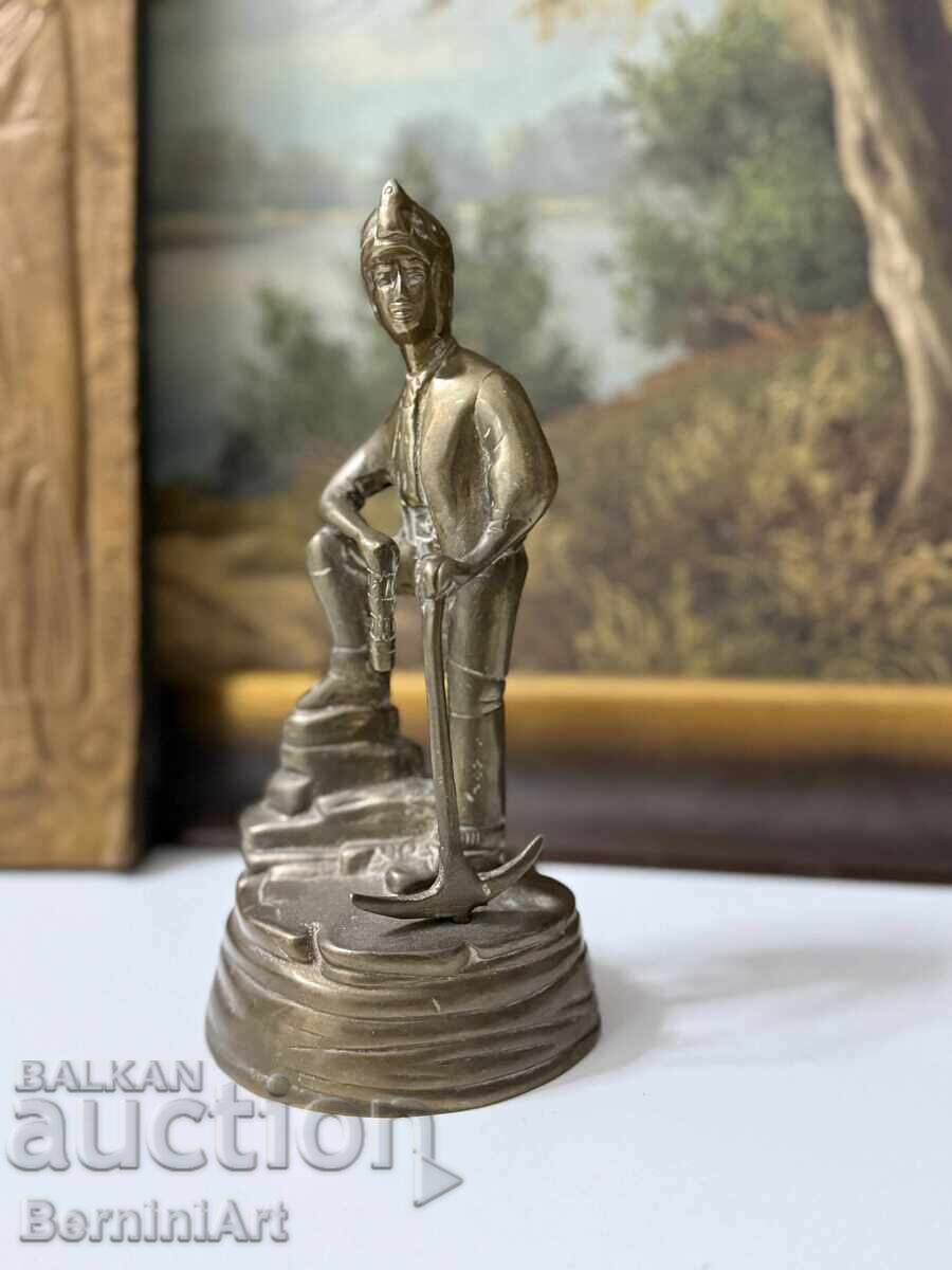Livrarea Figurină de miner