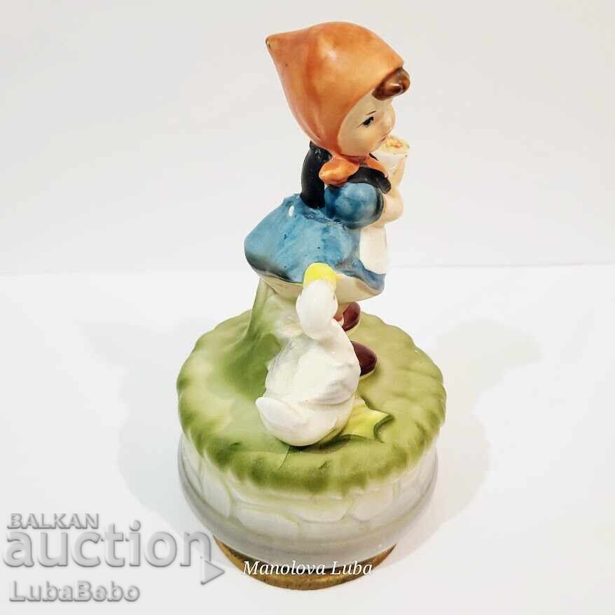 Livrarea Cutie muzicală vintage în stil Hummel