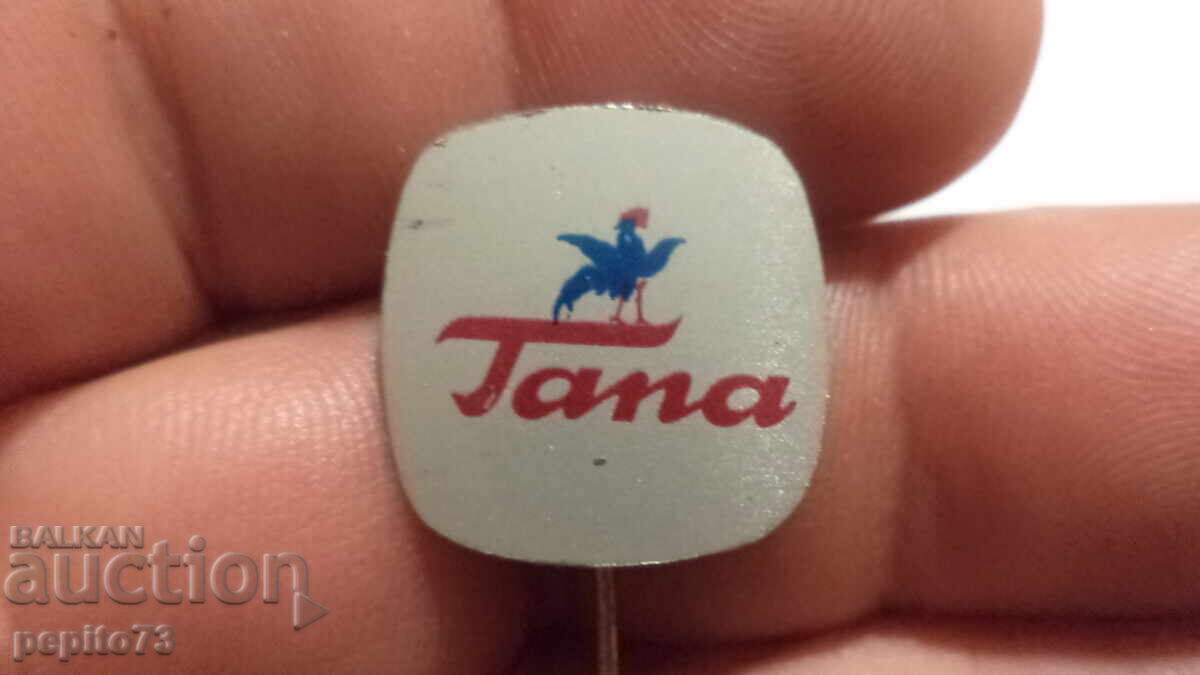 Διαφημιστικό σήμα, Tana, μάρκα κεριού για παπούτσια