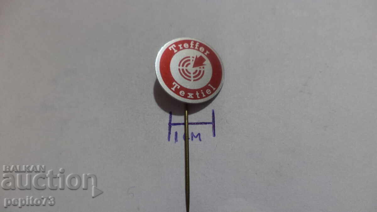 Licitație Emblemă publicitară, Treffer Textiel, marcă textilă