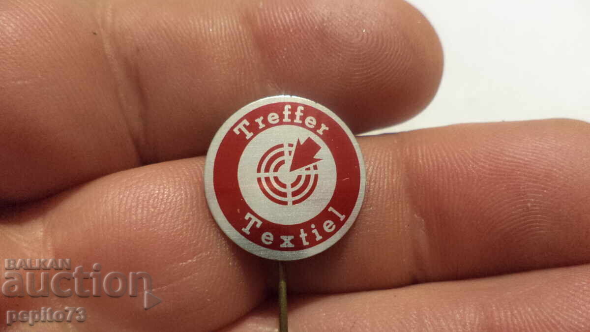 Emblemă publicitară, Treffer Textiel, marcă textilă