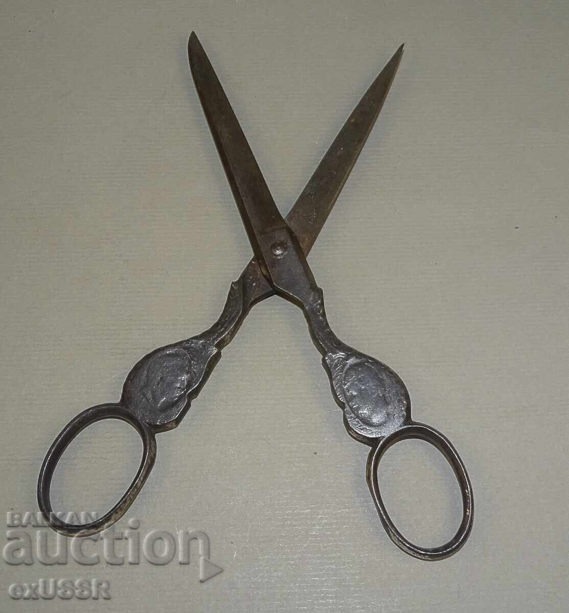 Old tailor's scissors with ornaments for needlework
