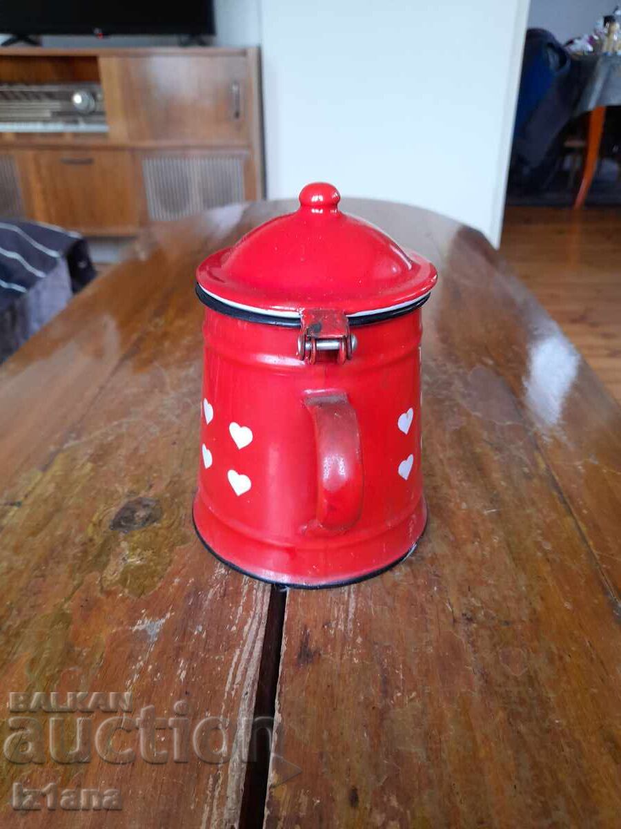 Delivery of Old enamel teapot