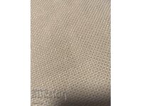 Un material textil bej de top