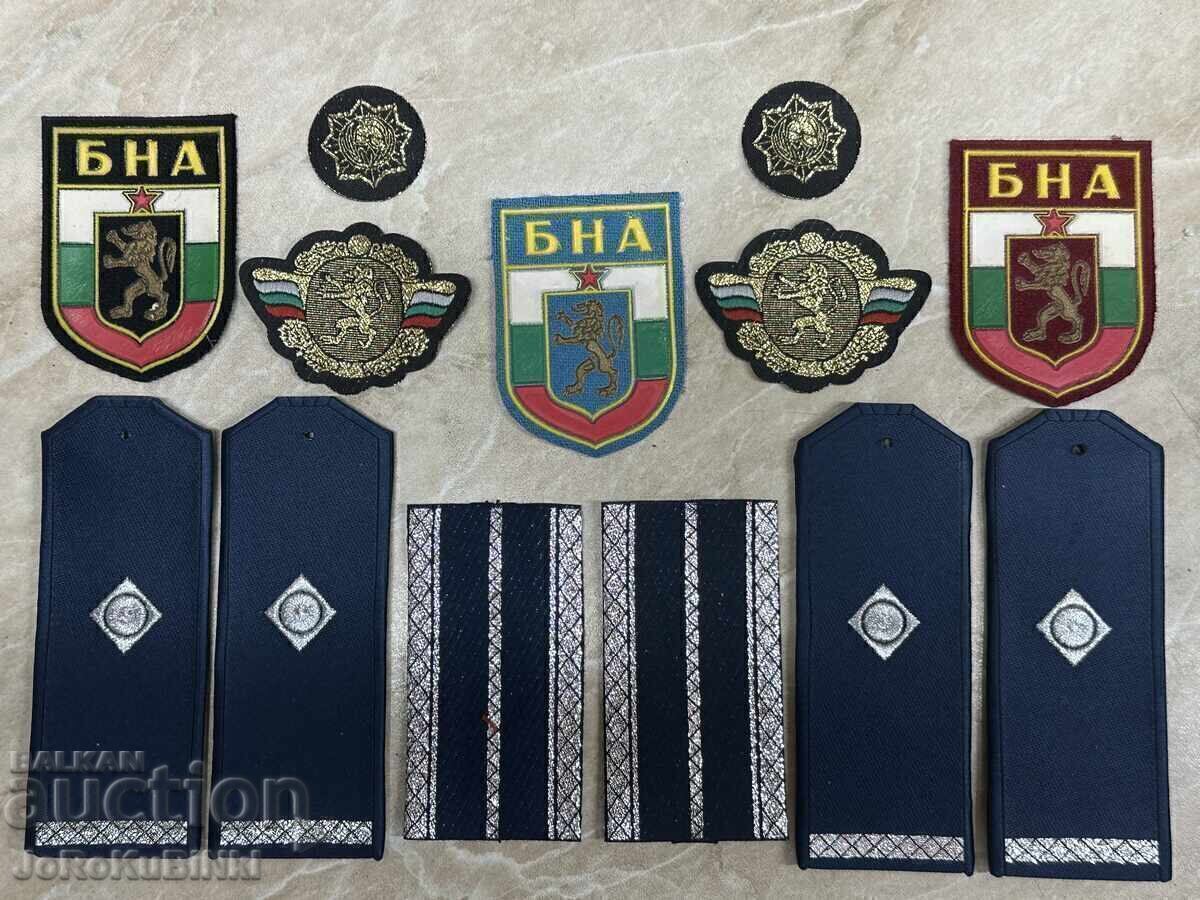 LOT Emblems and Epaulettes—(emblems - 7 pieces + epaulettes - 3 pairs) LOT Emblems and Epaulettes—(emblems - 7 pieces + epaulettes - 3 pairs)