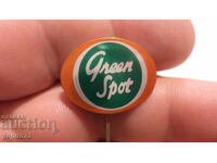 Znachka publicitară, Green Spot, marcă budincă