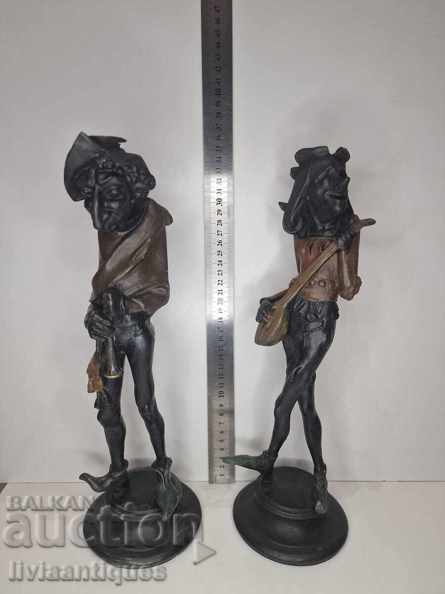 Δύο μπρούτζινα κηροπήγια αρλεκίνοι