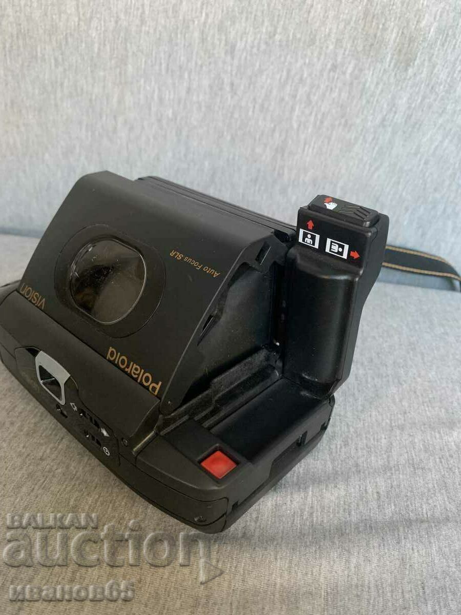 Auction  polaroid vision camera