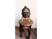 Buddha cu ochi închiși, simbolizând meditația și pacea interioară