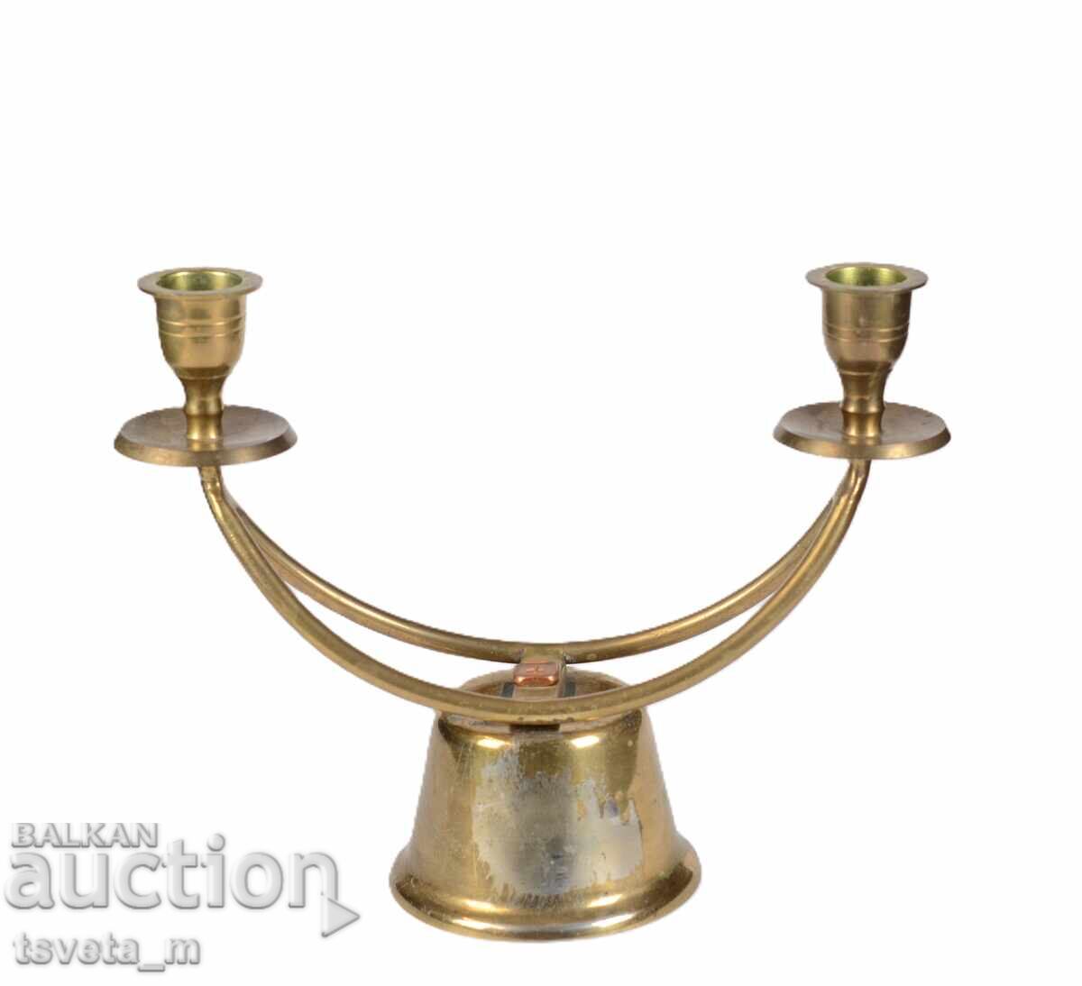 Auction  Antique bronze candlestick for two candles
