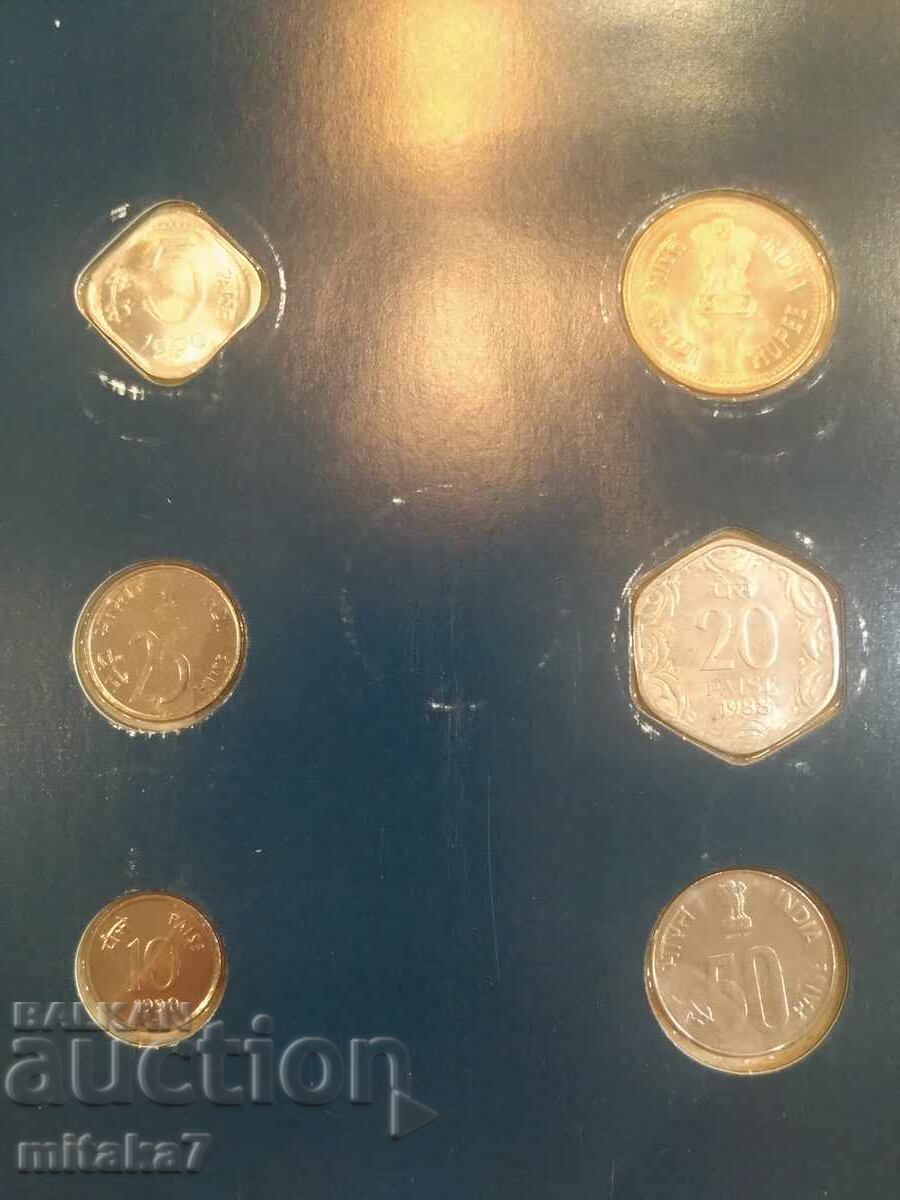 Delivery of Set of coins and postage stamp, India