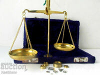 Old goldsmith's, apothecary's, and jeweler's scale in a box