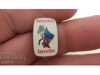 Insigna publicitară, Doesschate, marcă de condimente