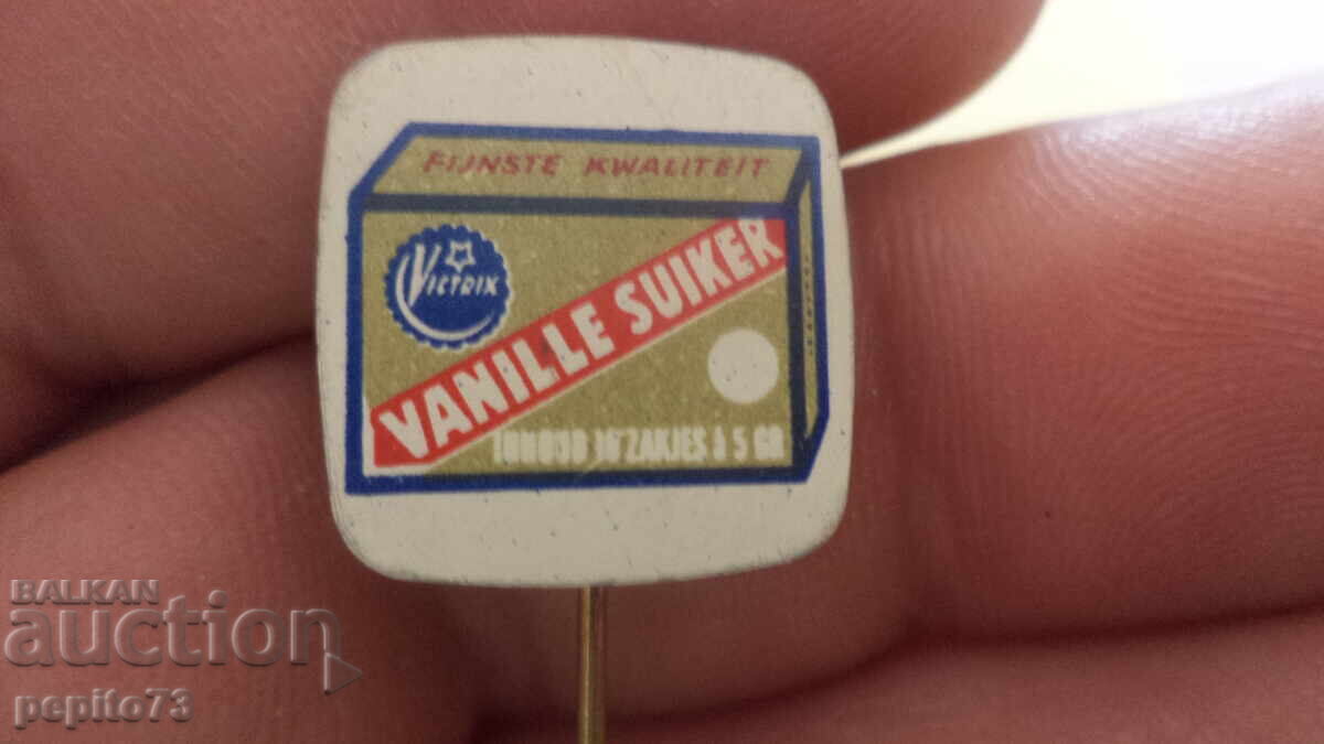 Insigna publicitară, Vanille Suiker, marcă zahăr vanilat