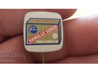 Insigna publicitară, Vanille Suiker, marcă zahăr vanilat
